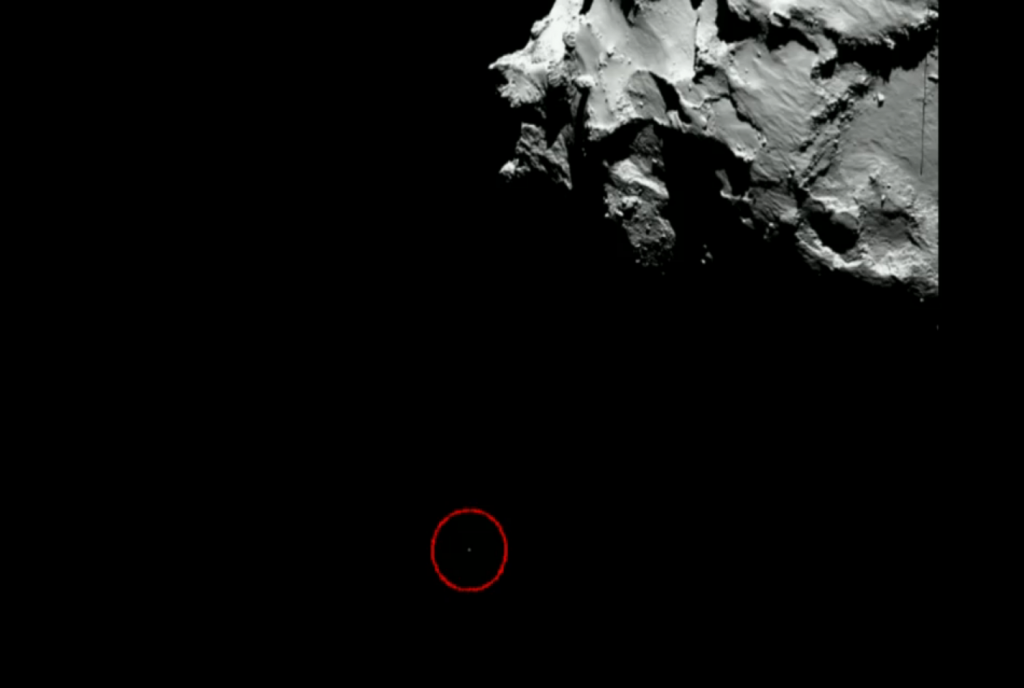 Посадочный модуль Philae на фоне кометы